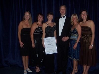 Photo of the Barking Mad team at the franchisee of the year awards
