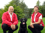 Photo of Barking Mad dog volunteers and a happy friend