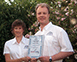 Photo of Stewart Collins and Tina O’Connor - two of the many Barking Mad dog sitters