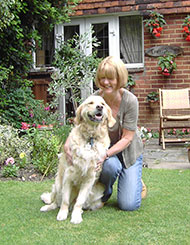Photo of Barney J White enjoying himself with one of our dog volunteers