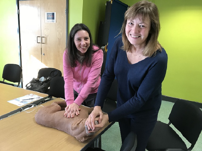 Joanne and Kathleen perform CPR on a resuscitation dog #teamwork!