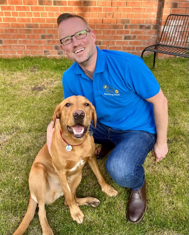 Jonathan McDonnell-Rogers with Hazel Labrador dog